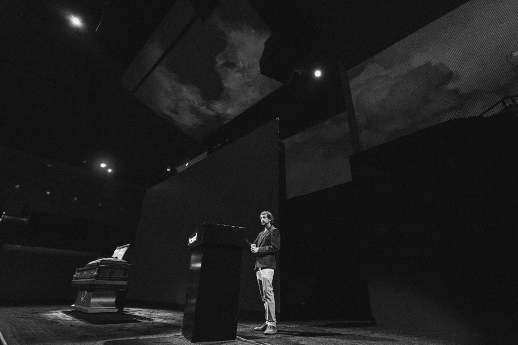 A speaker at the podium on the main stage